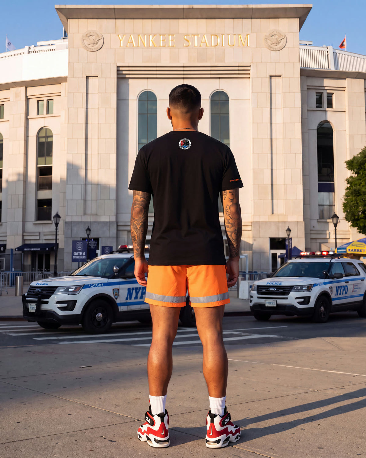 Back view of the First Responders Tee and Shorts outside Yankee Stadium