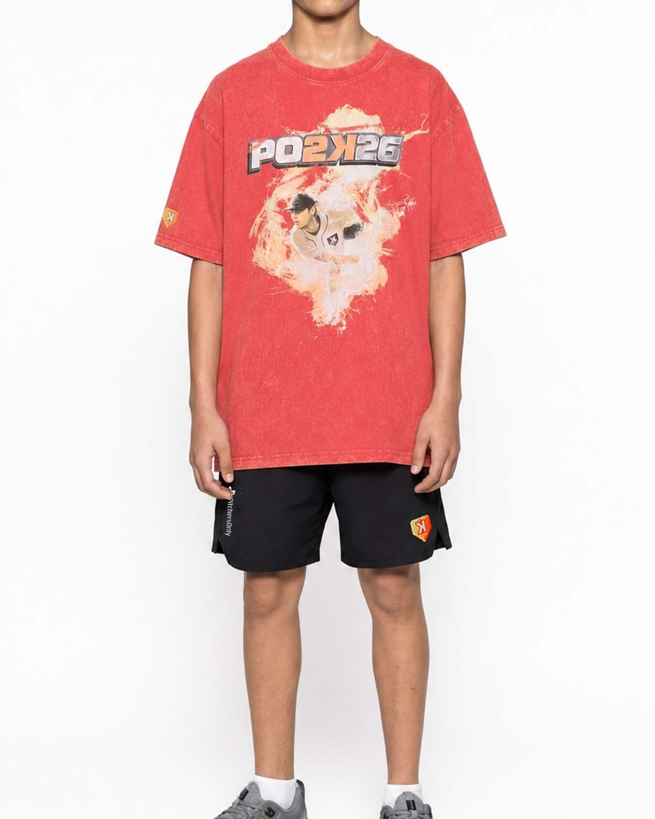 Youth PO2K Tee worn with black shorts, full outfit