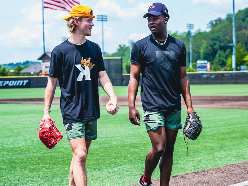 Two players walking off the field