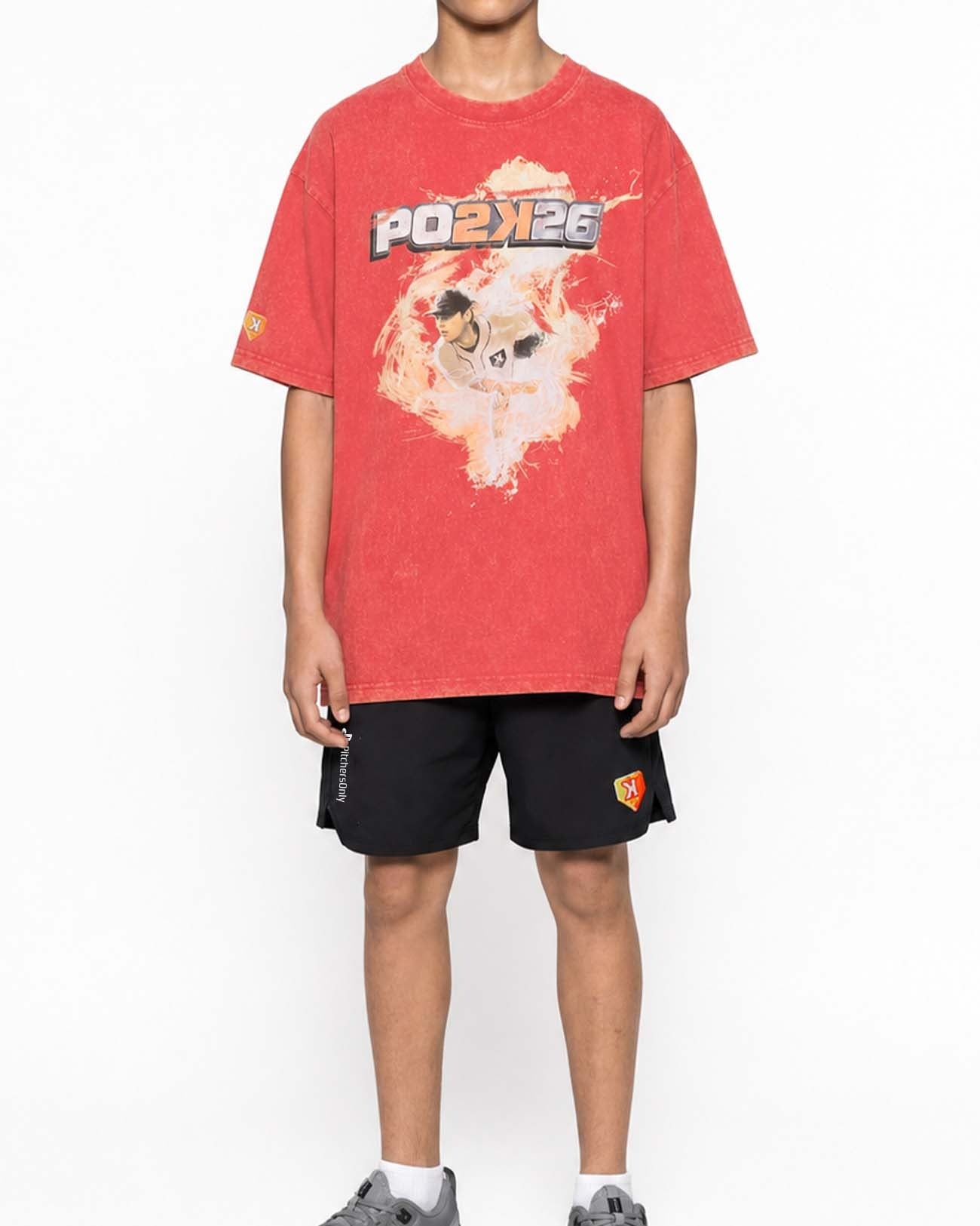 PO2K Tee worn with black shorts, full outfit